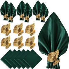 green napkins with gold leaf decorations and matching napkin clips are arranged in front of each other