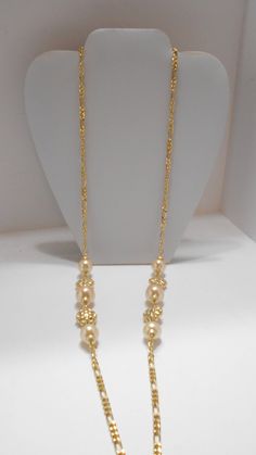 "Vintage 36\" gold tone chain necklace with six 15mm faux pearls. Four gold tone discs spacers in between the faux pearls. Pretty! Excellent condition. Unsigned." Funky Necklace, Pearl Chain Necklace, Glass Bead Necklace, Pearl Chain, Plastic Beads, Gold Tone Metal, Chains Necklace, Faux Pearl, Glass Beads