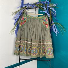 Hazel Anthropologie Boho Colorful Embroidered Skirt A Fun Full Peasant Skirt With Intricate Embroidered Detail 100% Cotton, Fully Lined Size Small Festive Green Embroidered Bottoms, Traditional Full Skirt For Spring, Relaxed Cotton Skirt With Embroidery, Cotton Embroidered Skirt With Relaxed Fit, Flowy Full Skirt With Embroidery, Flowy Full Embroidered Skirt, Fitted Folk Style Skirt, Traditional Lined Skirt For Spring, Festive Flared Skirt For Summer