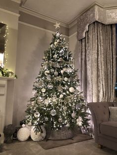 a decorated christmas tree in a living room