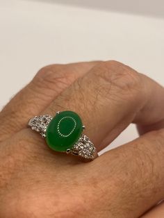 Vintage Lucky Green Nephrite Jade Ring https://www.etsy.com/listing/1073234687/vintage-lucky-green-nephrite-jade-ring Aventurine Gemstone Ring Jewelry, Oval Jade Rings Hallmarked, Green Jade Round Stone Jewelry, Fine Jewelry Green Oval Cabochon Rings, Green Jade Jewelry With Round Stone, Jade Gemstone Ring With Round Stone, Jade Gemstone Ring Jewelry, Fine Jewelry Jade Ring For May Birthstone, Green Jade Jewelry For Promise Ring