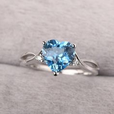 ◆ The ring is handcrafted from sterling silver and decorated with a dazzling 8*8 mm Swiss blue topaz and CZs. It is suitable for engagement/anniversary/daily occasion. ◆ Production Description: Main stone Type: Swiss blue topaz Main Stone Shape: Heart Cut Main Stone Size: 8*8 mm(2.34ct) Side stone: CZ Metal: 925 Sterling silver - Other options available in the drop down menu ◆ Customization: √Free for Add Engraving √Other Metal Type Available √Other Gemstones & Shapes Available √Personalization November Birthstone Engagement Ring, Pastel Blue Rings, Sky Blue Rings, Silver Ring Blue Stone, Engagement Rings Silver Blue, Topaz Diamond Promise Ring, Light Blue Solitaire Ring For Anniversary, Silver Heart Cut Topaz Ring Gift, Heart Cut Silver Topaz Ring For Gift