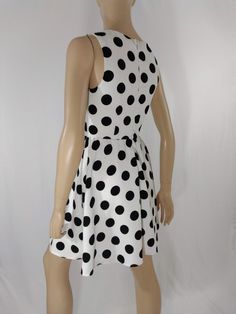 "Women's Dress Black White Polka Dot Classic Vintage by ALYA SIZE S Black and white LARGE polka dots sleeveless pull over dress with scoop neck. High quality. Excellent like new condition. Easy to wear casual chic vintage for the disco sporting life. MEASUREMENTS: Length - 32.5\" Bust (underarms to underarms) - 33-36\" Waist - 27\"unstretched Hips -22\"x2 MODEL STATS: Ht. - 5' 8.5\" Bust - 34\" Waist - 25\" Hips - 35\" *Please check measurements to ensure proper fit and remember to allow extra r Polka Dot Knee-length Sleeveless Dress For Spring, Polka Dot Sleeveless Daywear Dress, Fitted Polka Dot Sleeveless Dress For Spring, Polka Dot Sleeveless A-line Dress For Summer, Casual Polka Dot Sleeveless Party Dress, Casual Polka Dot Sleeveless Dress For Party, Fitted Polka Dot Sleeveless Casual Dress, Polka Dot Sleeveless Lined Dress, Polka Dot Sleeveless A-line Dress