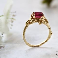 FREE SHIPPING WORLDWIDE.Gold filled ring with fuchsia CZ stone.After many years of rumors, the treasure of precious stones was found. Precious stones from faraway lands with love for bold colors.The treasure was located within a raspberry bush in the secret garden.The Secret Garden collection is inspired by the living sculptures designed and created by nature. All of the jewelry is personally designed and sculpted by hand in stunning details by Noga Berger.This ring is for women with strong love Gold Ring Ruby, Nature-inspired Gemstone Ring As A Gift, Spiritual Gemstone Rings For Anniversary, Nature-inspired Crystal Gemstone Ring As Gift, Gold Emerald Ring With Nature-inspired Design, Unique 14k Gold Emerald Ring As Gift, Nature-inspired Birthstone Rings For Gifts, Gold Nature-inspired Emerald Ring As A Gift, Nature-inspired Gold Emerald Ring As A Gift