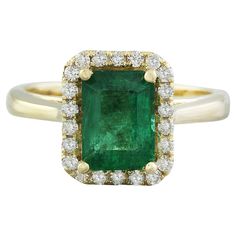 2.30 Carat Natural Emerald 14 Karat Solid Yellow Gold Diamond Ring Stamped: 14K Total Ring Weight: 5 Grams Emerald Weight 1.95 Carat (8.00x6.00 Millimeters) Diamond Weight: 0.35 carat (F-G Color, VS2-SI1 Clarity) Face Measures: 12.00x10.50 Millimeter SKU: [600761] Yellow Gold Diamond Ring, Emerald Diamond Ring, Gold Diamond Ring, Halo Diamond Ring, Gold Diamond Rings, Emerald Diamond, Natural Emerald, Solid Yellow, Yellow Gold Rings