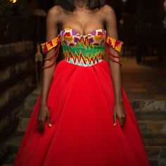 This is a ball gown from the Regalrose collection  by Melissa Arthur  The full collection can be found on my Instagram page @mel_arthur_lisa  The ball gown is made out of hand woven Ghanaian Kente which is emblished by hand with beads and pearls on the upper bodice . It has off-the-shoulder  dropping sleeves which are further emblished with two strings of pearls on each arm. The lower section is made out of scuba fabric and is a very full and flowy skirt with a trail of about 25inches  The gown Strings Of Pearls, Scuba Fabric, String Of Pearls, Accra, Flowy Skirt, Instagram Page, Dress Clothes For Women, Ball Gown, Body Measurements