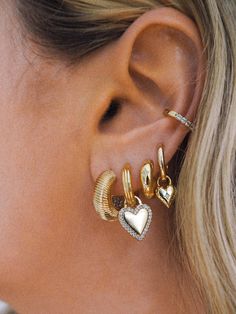 Experience the most luxurious hoops. Our durable sterling silver base is topped with a thick coat of 14k gold plating that can be worn 24/7. Pick your fav size. PS these make such a great gift. 14k gold plated sterling silver XS hoops measure approx 9.5mm S hoops measure approx 13.5mm M hoops measure approx 18mm Coated for long-wearing protection Does fit our charms if you want to add one! Stacked Earrings, Chunky Earrings, 14k Gold Necklace, Waterproof Jewelry, Jewelry Lookbook, Iconic Style, Gold Collection, Sterling Silver Hoops, Sterling Silver Charm