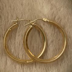 Classic And Elegant Hoop Earrings In 14k Solid Yellow Gold. They Are Over 1 Inch Wide And Round Shaped. They’re Thick And Have Lots Of Gold In Them. They Have Snap Back Closure. Hoop Earrings Are Timeless And Fantastic For Everyday Wear. Easy To Dress Up Or Down. And They’re In 14k Solid Gold Not Plated Or Filled, So You Can Wear Them Forever! Great Vintage Condition, Ready To Wear. They Would Make A Great Gift For Someone Special Or Yourself. Vintage, Antique, Retro, 14k, 18k, 10k, Filigree, Es Classic 14k Stamped Hoop Earrings, 14k Gold Stamped Hoop Jewelry, Classic Hinged 14k Gold Hoop Earrings, Formal 14k Gold Hallmarked Hoop Earrings, Gold Hoop Earrings Stamped 14k For Wedding, Elegant Small Hoop Hinged Earrings, 14k Stamped Huggie Earrings For Anniversary, Elegant Small Hinged Hoop Earrings, Timeless Hoop Jewelry For Formal Occasions