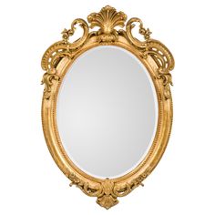 an ornate gold framed mirror on a white background