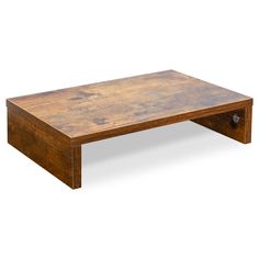 a wooden coffee table with one drawer on the bottom