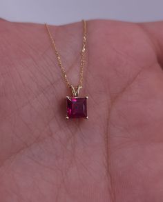 This is a beautiful princess cut pendant design that is handmade brand new. It is set in real Solid 14Kt Gold. You can choose if you want 14Kt White Gold, 14Kt Yellow Gold or 14Kt Rose Gold.  I have this pendant available with all gemstones that you can see in my store.  This is the perfect gift for mom, wife, fiancee, girlfriend, valentine, daughter, family or friend. It is a special gift for mother's day, valentine's day, wedding, bridesmaid, anniversary, birthday, Christmas, Easter, New Year's and any holiday. Solid 14Kt Gold July Birthstone Pendant Size: 12mm(0.472 inches) x 7mm(0.275 inches) 6mm Created Ruby, 1 Carats Comes with Solid 14Kt Gold 18 inch chain (If you need a longer or shorter chain contact me) Comes in jewelry box MATCHING EARRINGS BRACELETS & RINGS AVAILABLE Fine Jewelry With Square Cut Birthstone, Fine Jewelry Birthstone Square Cut, Fine Jewelry Princess Cut Jewelry Gift, 14k Gold Jewelry For Gift With Square Cut, 14k Gold Jewelry With Square Cut For Gift, Fine Jewelry Solitaire Necklace With Square Pendant As Gift, 14k Gold Square Cut Jewelry For Gift, Radiant Cut Jewelry With Accent Stones For Gifts, Princess Cut Jewelry With Accent Stones