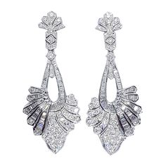 Diamond 2.45 carats Earrings set in 18 Karat White Gold Settings Width: 1.8 cm Length: 4.5 cm Total Weight: 12.71 grams "We first opened doors in 1980 when it was then situated in the vicinity of the Victory Monument; a small and modest storefront with a couple of counters. From its humble beginnings to where it stands today, our company has proven its abilities as a jeweler. Since the beginning, we have been supplying fine quality pieces to dealers, wholesalers and customers worldwide. From the Luxury Platinum Diamond Earrings Hallmarked, Timeless Platinum Drop Earrings, Luxury Platinum Baguette Cut Earrings, Art Deco White Gold Diamond Earrings With Brilliant Cut, Classic White Gold Baguette-cut Earrings, Classic Diamond Cut Bridal Earrings For Evening, Luxury Hallmarked Diamond Earrings For Formal Occasions, Formal Platinum Diamond Earrings Baguette Cut, Formal Baguette Cut Platinum Diamond Earrings