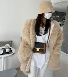 Chic Fluffy Fur Coat For Spring, Chic Fluffy Fur Coat, Chic Mink Outerwear With Faux Fur Lining, Chic Mink Color Outerwear With Faux Fur Lining, Chic Mink-colored Outerwear With Faux Fur Lining, Chic Faux Fur Winter Outerwear, Chic Faux Fur Outerwear For Winter, Chic Faux Fur Winter Coat, Winter Faux Fur Long Coat