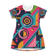 Share your retro love with the world with this 80s arcade pattern! This All-Over-Print T-Shirt Dress is tagless, custom cut and sewn to match every style. The fun prints will make this t-shirt dress a great piece to sell online. .: 100% Polyester .: White thread color .: Light fabric (6.0 oz/yd² (170 g/m .: Tagless .: Runs true to size .: Assembled in the USA from globally sourced parts Retro Fitted Printed T-shirt, Playful Short Sleeve Graphic Print Dress, Playful Short Sleeve Dress With Graphic Print, Retro Fitted T-shirt With Sublimation Print, Fitted Retro T-shirt With Custom Print, Fitted Retro Printed T-shirt, Multicolor Graphic Print Cotton Dress, Multicolor Cotton Dress With Graphic Print, Short Sleeve Multicolor Graphic Print Dress