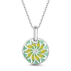 The motif of the compass flower radiating in gold loses itself in infinity, just like the sea does. A pretty necklace made from sterling silver and green&yellow enamel tones. The necklace is decorated with a delicate floral motif that radiates from its center. Elegant design.Carat Weight: 0.135 ctStone Size: 1,1.75 mmNumber of Stones: 10 Stone Shape: RoundStone Color: Diamond WhiteWeight: 3.1 gWidth: 15.9 mmHeight: 22.9 mmThickness: 4.9 mmMaterial: 925 SilverStone Type: Jeulia® StonePlating Colo Peace Flower, Dreamy Garden, Pretty Necklace, The Compass, Classic Necklace, Pretty Necklaces, White Necklace, Necklace Online, The Peace