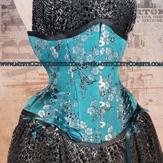 "Brand New underbust corset from \"MystiC City Corsets\" design: MCC-44L color: Picture ( teal cherry brocade) - 100% cotton twill lining - Steel boned (18 x 6mm wide spiral steel bones, 6 x 12mm wide flat steel bones ) - Front busk(black) - Underbusk - Steel boned floating modesty panel - regular \"shoe\" style lace Front: 11.25\" Side: 9-10.5\" Back: 12\" Busk: 9.75\" (black, Flexible) available sizes: 18\", 22\", 24\" ,26\", 28\", 30\", 32\" , 34\", 36\"" Blue Overbust Corset Dress For Costume Party, Green Overbust Corset For Costume Party, Blue Corset With Boned Bodice, Blue Corset Dress With Fitted Bodice, Blue Overbust Corset For Costume Party, Blue Fitted Underbust Corset Dress, Fitted Gothic Green Corset, Blue Underbust Corset With Fitted Bodice, Blue Fitted Corset For Costume Party