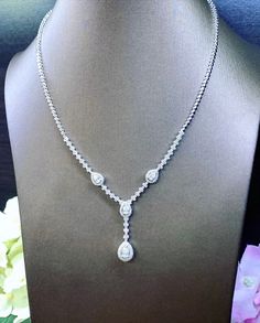 HANDCRAFTED TO PERFECTION! SPECIAL, BRIDAL PERFECT DESIGN! Featuring 4 pcs of large 0.2-0.3 carat pear diamond and 197 accent, UNTREATED AND GENUINE F/VS QUALITY SPARKLING DIAMONDS! Perfect for everyday! SET IN 18K SOLID WHITE GOLD HANDCRAFTED NECKLACE! Perfect as a gift or necklace for any occasion! Sometimes round diamonds are just so boring, why not have a little fun and try pear shaped diamonds? It's symmetric. It's sparkling. And it's eternally precious! SUGGESTED RETAIL VALUE: $7,800 DIAMO White Pear Diamond Necklace With Prong Setting, Platinum Bridal Necklace With Diamond Accents For Anniversary, Exquisite White Gold Bridal Necklace With Brilliant Cut, Exquisite Platinum Diamond Wedding Necklace, Exquisite Platinum Diamond Necklace For Wedding, Silver Platinum Bridal Necklace Gift, Silver Platinum Bridal Necklace As Gift, White Diamond Necklace With Pear Shaped Accents, Fine Jewelry Platinum Diamond Necklace For Wedding