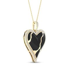 What's broken becomes stronger, as represented by this heart-shaped Kintsugi-inspired pendant. 10K gold Pendant features a heart-shaped black ceramic Kintsugi-inspired inset. This design takes inspiration from the ancient Japanese craft of Kintsugi that mends broken pieces of pottery back together using gold. The pendant is outlined with 1/4 ct. t.w. of sparkling diamonds. 18.0-inch cable chain; lobster claw clasp. Kintsugi Jewelry Pendants, Black Locket Jewelry For Anniversary, Black Heart-shaped Necklace For Keepsake, Black Heart Necklace For Keepsake, Black Locket For Anniversary, Black Heart Necklaces For Keepsake, Black Locket Necklace For Anniversary, Black Pendant Jewelry For Keepsake, Anniversary Black Locket Necklace