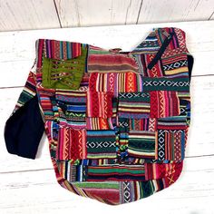 Elevate your bohemian style with our Handmade Gheri Cotton Patchwork Sling Bag, a unique and colorful accessory designed for those who appreciate artistry and functionality.Artisanal Craftsmanship: Handcrafted with care, each bag features a distinctive patchwork design using Gheri cotton, known for its durability and vibrant patterns. Multi-Pocket Design:Stay organized on the go with multiple pockets. This sling bag includes a spacious main compartment, two front pockets with Velcro closure, one Multicolor Patchwork Hobo Bag For Everyday Use, Multicolor Patchwork Hobo Bag For Daily Use, Daily Use Multicolor Patchwork Hobo Bag, Colorful Patchwork Shoulder Bag For Daily Use, Colorful Patchwork Shoulder Bag For Everyday Use, Casual Multicolor Patchwork Hobo Bag, Casual Green Patchwork Shoulder Bag, Green Patchwork Shoulder Bag For Travel, Bohemian Patchwork Cotton Shoulder Bag