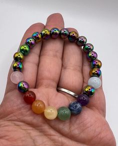 Pride Bracelets, made with multi stones to represent the lgbtq flag colors, including rainbow hematite, which provides focus balance and clarity of thought. Aiding in self esteem. Spiritual Rainbow Bracelets With Round Beads, Adjustable Rainbow Stretch Bracelet Spiritual, Adjustable Rainbow Stretch Bracelet, Spiritual Style, Adjustable Rainbow Spiritual Stretch Bracelet, Rainbow Round Bead Bracelets For Meditation, Rainbow Spiritual Stretch Bracelet With Round Beads, Spiritual Rainbow Stretch Bracelet With Round Beads, Spiritual Rainbow Crystal Bracelet With Round Beads, Rainbow Crystal Bracelet With Round Beads For Gift