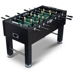 the foosball table is black and has four legs