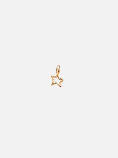 For the daydreamers. Shoot for the stars in this mini star charm. Wear this on Mandy Reid's signature Paperclip chain next to your favorite initial. Solid 14k gold Charm measures 1/2" in height Made in New York Shoot For The Stars, Authentic Jewelry, Shooting Stars, Star Charms, Gold Charm, Paper Clip, Initials, Im Not Perfect, Yellow Gold