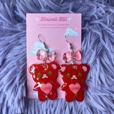 ~*Super cute animal Valentines day earrings*~  ♡  Handmade resin charms with painted details ♡ Please note: as these are handmade there may be some small imperfections e.g. irregularities in the paint or small holes caused by bubbles  ♡ 925 silver hooks, please see my add-on listings for alternatives including clip-ons! ✨  I ship within 3 - 5 working days unless otherwise stated. All items will be sent first class (or tracked if you are not in the UK), if you prefer second class / standard shipping please message me. If your order is a gift or you require faster dispatch, please send me a message before ordering and I'll do my best to accommodate!  Please leave me a positive review if you like your items, and in the rare instance there is a problem please do message me before leaving a rev Kawaii Dangle Jewelry For Valentine's Day, Valentine's Day Kawaii Dangle Jewelry, Red Resin Novelty Earrings, Handmade Red Kawaii Jewelry, Playful Earrings As Valentine's Day Gift, Playful Earrings For Valentine's Day Gift, Cute Red Handmade Jewelry, Cute Pink Earrings For Gift, Cute Pink Earrings For Gifts