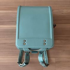 Randoseru : This randoseru made by Tsuchiya Bag company Which is one of the best randoseru maker in Japan. Its made by high quality Cowhide.  Item: Cowhide Leather school Bag / Japanese Randoseru - Light blue & White No.rnd012 Condition: Used/ Good. Please check the listing pictures. Size: Adult Wearable You could put your laptop without any ploblem. Tsuchiya Bag Company / Made in Japan Tsuchiya bag is one of the best randoseru maker in Japan. https://fujiyamarock.etsy.com Shipping Japan Post ta Large Capacity Leather Satchel Backpack For School, School Leather Satchel Backpack With Large Capacity, Green School Satchel, Large Capacity Leather Satchel Backpack For Students, Large Capacity Leather School Backpack, Large Capacity Leather Shoulder Backpack For School, Rectangular Laptop Bag For Students, Rectangular Shoulder Bag For Back To School, Rectangular Satchel For Back To School