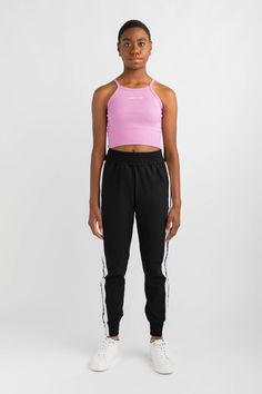 An essential style for everyday wear. Designed in a high neckline, racer style shape that is cropped in length. Features a soft finish folded hemband that is ultra-comfortable to wear. Ideal to layer over crop tops. Cropped Athleisure Bottoms For Sports, Athleisure Cropped Sports Bottoms, Casual Seamless Cropped Sports Bra, Spring High Stretch Cropped Activewear, Spring Cotton Crop Top Activewear, Cropped High Stretch Spring Activewear, Spring Cropped High Stretch Activewear, High Stretch Cropped Activewear For Spring, Casual Crop Top Sports Bra