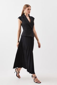 This Expertly-Crafted Garment Combines The Fluidity Of Soft Pleats With The Directional Aesthetic Of A Tailored Blazer. Notched Lapels Provide A Directional Touch, While Soft Pleats Cascade Down To Just Below The Knee.Linen Fabricationcompact Stretchpleated Skirtmidi Hemline Waistcoat Style, Tailored Blazer, Pleated Midi Skirt, Fitted Silhouette, Flared Skirt, Karen Millen, Fashion Face, Black Midi Dress, Fitted Bodice