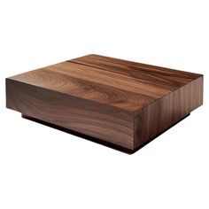 a wooden box sitting on top of a white surface