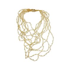 This hand-crocheted layered necklace were fabricated by skilled Brazilian artisans. They are shiny wire crochet earrings and they create a statement look without weight or bulk! Necklace secures through magnetic clasp Length approx. 28″ inches Hand Crocheted 18 Karat Gold Filled Made in Brazil Velvet Bag Included One Year Warranty They are very comfortable to wear, light and can be worn in every occasion: day-to-night and casual-to-special. The sparkling beads and colors are supplemental to the Gold Multi-strand Bridal Necklace, Elegant Multi-strand Chain Necklace With Gold Beads, Delicate Gold Jewelry With Gold Beads, Bohemian Handmade Gold Bridal Necklace, Multi-strand Gold Beads Jewelry Gift, Handmade Multi-strand Wedding Jewelry, Handmade Gold Double Strand Necklace, Gold Double Strand Handmade Necklace, Gold Handmade Double Strand Necklace