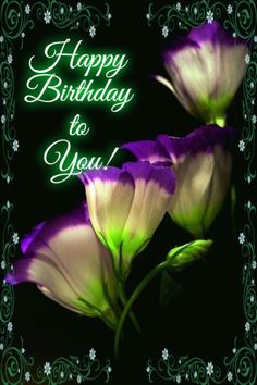 two purple and white flowers with the words happy birthday to you