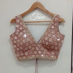 This Made to Order/Made to Measurement/Custom Made Indian Ethnic Blouse. - Fabric - Mirror Work Georgette - Color - Dusty Pink  - Princess Cut - Rich Lined - Sleeveless - Extra margin and extra stitches included in the blouse - It can be customize in any color, design or size  MEAUREMENTS & CUSTOMIZATIONS This blouse can be purchased in your standard sizing and pattern. Please choose your Chest Size (measured in inches) from the drop-down box.. For custom sizing please include the below measurem Anarkali Sleeveless Choli For Reception, Sleeveless Anarkali Choli For Reception, Designer Anarkali Sleeveless Choli, Bollywood Style Lehenga For Navratri, Bollywood Lehenga For Navratri, Semi-stitched Lehenga With Pallu, Pink Sleeveless Saree For Navratri, Semi-stitched Sleeveless Lehenga With Pallu, Pink Anarkali Sleeveless Choli