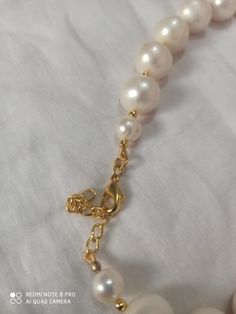 23'' 626 Carat AAA Quality Natural Fresh Water Pearl round Pearls Baroque Pearl With gold Plated Pendent Gemstone Necklace with earring Stone :Natural Fresh Water Pearl Shape : round Size :-13*13- 15*15mm Weight :- 626 carat length - 23 inch Pendent - gold Plated Polish :- Handmade Purity :- 100% Natural Gemstone color - white (If you want maximum or minimum quantity of this size other than listed, let me know, i will list/provide it to you in wholesale price.) Click below to see live stock: htt Single Strand Round Costume Jewelry, Pearl White Baroque Jewelry For Formal Occasions, Baroque Pearl White Jewelry For Formal Occasions, Bridal Necklace With Pearl Pendant And Round Beads, Baroque Pearl Necklace For Formal Occasions, Baroque Pearl Drop Jewelry, Round Pearl Costume Jewelry Necklace, Formal Single Strand Baroque Jewelry, Elegant Baroque Pearl Jewelry