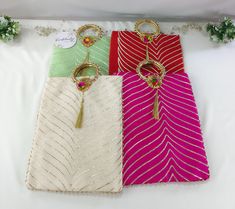 Enhance your festive attire with this leheriya Potli bag.  Product Contains   * Handbag Potli (1)  Product Details   * Product Name:- multi-color Potli Bag * Size:- (W*L) -  10.5*9 inches  Product Uses  * Carry this stylish potli bag to complement your traditional outfits * Used to present gifts to guests, bridesmaids, and close family members * Beautiful packaging option for gifts during  haldi/mehndi wedding occasions   * They can be a good wedding favor, baby shower gifts  Note  * The buyer s Mehndi Wedding, Nikah Ceremony, Festive Attire, Close Family, Potli Bag, Best Wedding Favors, Potli Bags, Travel Organizer, Wedding Bag