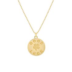 Whether embarking on new adventures, facing challenges, or simply seeking a boost of positivity, our Good Luck & Clover Sentiment Pendant Necklace is the perfect way to carry a tangible expression of fortune with you always. A solid 18-karat disc inscribed with the 'Good Luck' and featuring one of our favorite tokens of fortune, a 4-Leaf Clover is sure to make the perfect gift for yourself or a sentimental gift for a loved one to carry your support with them always. 20 inch, 14-karat diamond cut Tarnish Resistant Gold Plated Necklace For Good Luck, Gold Plated Tarnish Resistant Necklace For Good Luck, Good Luck Engraved Round Pendant Necklace, Engraved Round Necklace For Good Luck, Gold Plated Round Necklace For Good Luck, Sterling Silver Coin Pendant Necklace For Good Luck, Yellow Gold Good Luck Pendant Necklace, Tarnish-resistant Yellow Gold Charm Necklace For Good Luck, 14k Gold Engraved Necklace For Good Luck