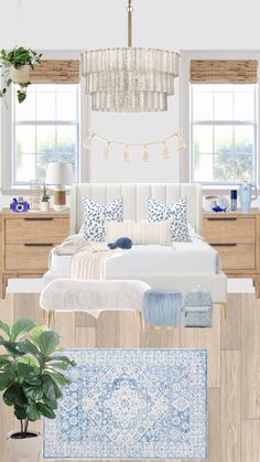 a bedroom with blue and white decor in the room, including a bed, dressers,