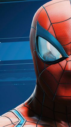 the amazing spider - man is looking at something in front of him with his eyes wide open