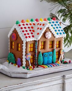 a gingerbread house decorated with candy and candies