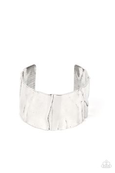 A warped silver cuff ripples and crinkles, creating an oversized industrial statement around the wrist. Sold as one individual bracelet. Silver Metal Cuff Bracelet Hand Cast, Silver Hand Cast Metal Cuff Bracelet, Silver Hammered Metal Bangle, Silver Hammered Metal Cuff Bracelet, Modern Hammered Metal Cuff Bracelet, Elegant Country, Life Is Too Short, Paparazzi Accessories, Affordable Jewelry