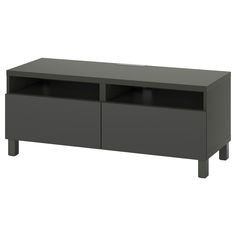 an entertainment center with two doors and shelves on one side, in dark grey finish