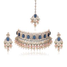 *PRODUCT DETAIL* * Material: Brass * Plating: Gold Plated * Stone: Semi Precious Kundan & Pearl *DIMENSIONS * * Necklace- Weight: 141 gm Length 8.3 Inches Width: 3.2 Inches * Earrings- Weight: 18 gm Each, Length: 3.5 Inches, Width: 1.25 Inches * Tikka: Weight: 23 gm Each, Length: 3 Inches, Width: 1.25 Inches, Top Chain Length: 2 Inches *ABOUT PRODUCT* * Beautiful Jadau Kundan Choker Necklace with Pink Bead Highlights * Style Tip : Stunning Piece of Jewelry to get you noticed. *DISCLAIMER* * Blue Kundan Necklace For Reception Festivities, Blue Kundan Necklace For Festive Reception, Blue Kundan Necklace For Reception And Festive Occasions, Blue Kundan Necklace For Reception, Blue Bollywood Jewelry For Reception, Blue Kundan Necklaces For Reception, Blue Bollywood Necklace For Receptions, Blue Jewelry For Diwali Reception, Traditional Blue Jewelry For Reception