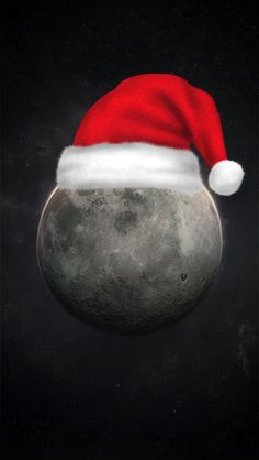 a santa hat is on top of the moon