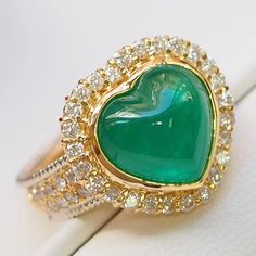 "This ring features a (12x12mm Heart cut lab Made Emerald). It is made by hand, and it will take about 6 to 8 days to finish the ring after your payment is completed. Main stone:12x12 mm  Cut Type: Heart cut Main stone: Lab Emerald Material: 925 sterling silver/rose gold/white gold/yellow gold Accent stone: american diamond Payment Policy We accept payment through PayPal only. We have selected PayPal because it is the safest and most reliable mode of payment which enables to rapid shipping to our buyers and protects their interests. Feedback Policy Please do not leave the Negative feedback or Natural feedback before giving us a chan to resolve your problems. Positive feedback will be automatic to leave for you when you give me Positive feedback to us in 24 hours. As per eBay policy we cann Emerald Stone Ring, Emerald Stone Rings, Wedding Anniversary Ring, Wedding Anniversary Rings, Sterling Silver Engagement Rings, Emerald Stone, American Diamond, Gold Accent, Beautiful Heart