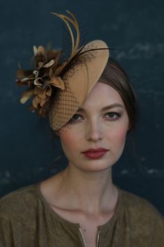 Lovely Light Beige Velour Fascinator with a Velvet Flower by DIVA HATS. Lovely light beige velour fascinator with a velvet flower. Women head accessories for weddings, routs, parties, derby. Ready-to-wear hats that respond to all the latest trends in fashion. Fascinator hats are highly detailed accessories that accentuate your outfits with a subtle charm and elegance. It resembles a hat but is much smaller and unpretentious. This is very comfortable - one size fascinator holds on a headband Beige Headpiece For Kentucky Derby Event, Formal Mini Hats With Handmade Flowers, Elegant Handmade Flowers Headpiece For Events, Elegant Headpieces With Handmade Flowers For Events, Handmade Flowers Fascinator For Formal Occasions, Beige Headband Fascinator, Beige Fitted Headband Fascinator, Fitted Beige Fascinator For Vintage Events, Chic Beige Fascinator For Races