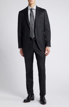 A subtle glen plaid woven in black and dusky greys distinguishes a versatile, all-occasion wool suit that's styled with traditional detailing from the notched lapels to the flat-front trousers. Jacket has notched lapels; four-button cuffs; chest pocket; flap pockets; interior pocket; side vents Trousers have zip fly with button-tab closure; flat front; slant pockets; back button-welt pockets Jacket is lined Trousers are unhemmed 100% wool Dry clean Made in Italy Tailored Black Wool Three-piece Suit, Black-tie Suits With Welt Pockets, Tailored Timeless Black Tie Suit, Timeless Tailored Black Tie Suits, Timeless Tailored Suit For Black Tie Events, Semi-formal Black Double Breasted Suit With Concealed Placket, Black Wool Three-piece Suit Single Breasted, Black Wool Single-breasted Three-piece Suit, Classic Black Double Breasted Suit With Concealed Placket