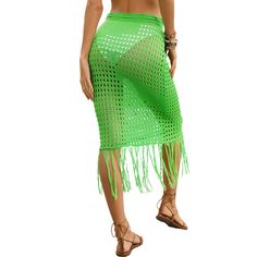 Green Hollow-out Tasseled Beach Cover Skirt Summer Beach Party Bottoms With Tassels, Summer Bottoms With Tassels For Beach Season, Beachy Skirt For Beach Vacation, Beachy Skirt For Vacation, Spring Vacation Beachwear Skirt, Summer Beach Bottoms With Tassels, Beachwear Bottoms With Tassels For Beach Party, Beach Party Bottoms With Tassels, Beachwear Bottoms With Tassels For Vacation