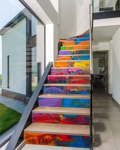 the stairs are painted with bright colors