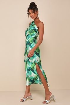 Catch everyone's attention with a memorable look like the Lulus Iconic Presence Green Abstract Satin One-Shoulder Midi Dress! Sleek woven satin, with a green abstract print throughout, shapes a single, sash strap that crosses the one-shoulder neckline and secures atop the open-back design with a knotted detail at the side. Fitted bodice features an asymmetrical, overlay with gathering at the sides. The figure-skimming silhouette continues into a slip-style skirt that finishes at a midi hem with Formal Green Silk Midi Dress, One Shoulder Green Cocktail Midi Dress, Green Abstract Print Midi Dress, Elegant One-shoulder Green Midi Dress, Elegant One Shoulder Green Midi Dress, Green Satin Midi Dress For Summer, Green Midi Length Dress With Abstract Print, Green Midi Dress With Abstract Print, Green One-shoulder Satin Midi Dress